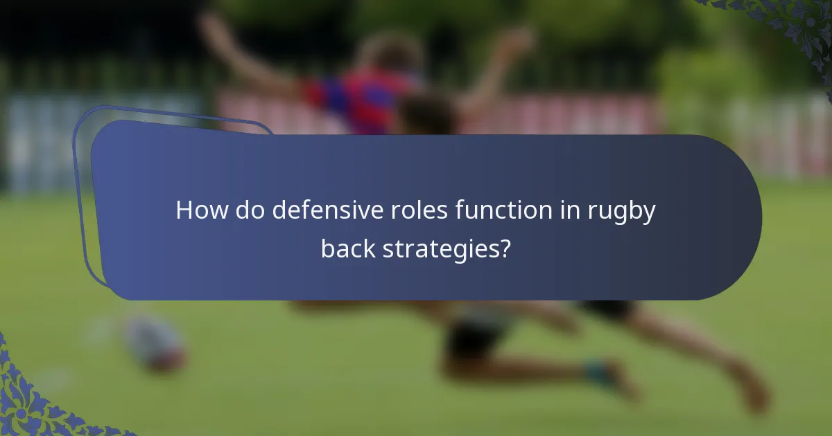 How do defensive roles function in rugby back strategies?